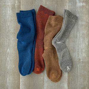 marled organic cotton socks on a wooden surface