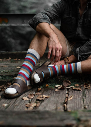 man wearing striped organic cotton socks